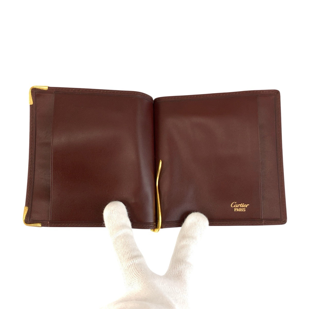 24008
CARTIER カルティエ マストライン ボルドー ゴールド金具 レザー 札入れ マネークリップ付き 折財布 メンズ A21