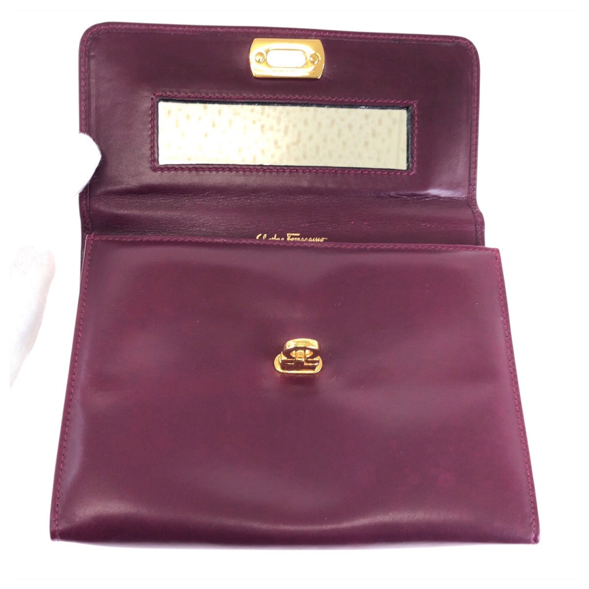 24213
Salvatore Ferragamo サルヴァトーレフェラガモ ガンチーニ パープル ワインレッド ゴールド金具 レザー 222038 ポーチ クラッチバッグ レディース AB30
