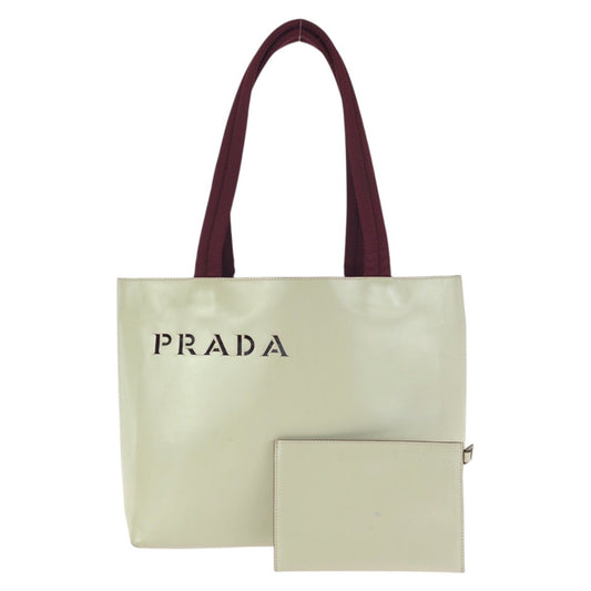 24230
PRADA プラダ パンチングロゴ ライトベージュ アイボリー ボルドー レザー ショルダーバッグ トートバッグ レディース ABP30