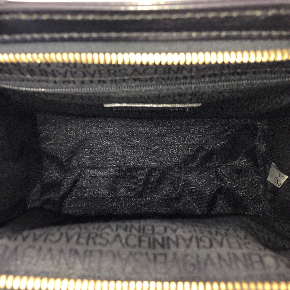 24236
VERSACE ヴェルサーチ ヴィンテージ サンバースト ブラック 黒 ゴールド金具 レザー ハンドバッグ トートバッグ レディース ABP42