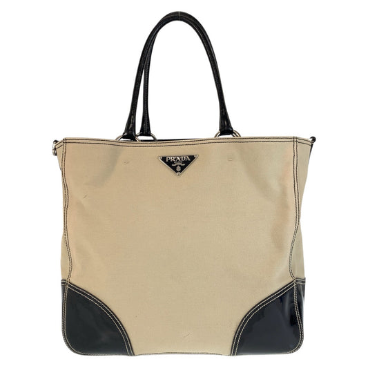 24307
PRADA プラダ 三角ロゴプレート ベージュ ブラック 黒 シルバー金具 キャンバス / エナメル トートバッグ ショルダーバッグ レディース AB