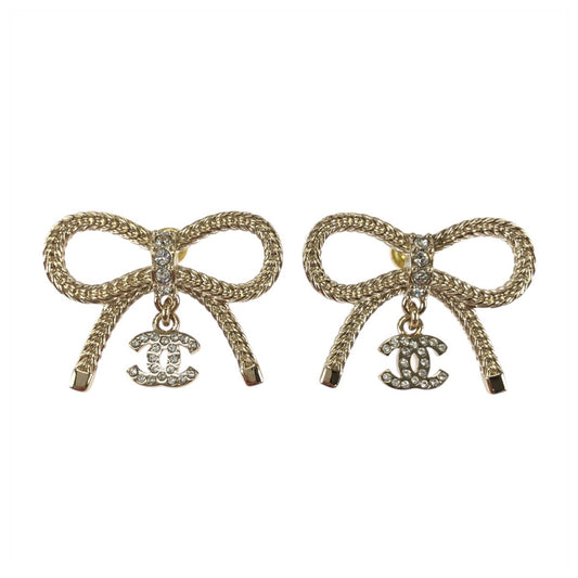24334
CHANEL シャネル リボン ココマーク ラインストーン ゴールド メッキ ピアス B24 K刻印 レディース N72