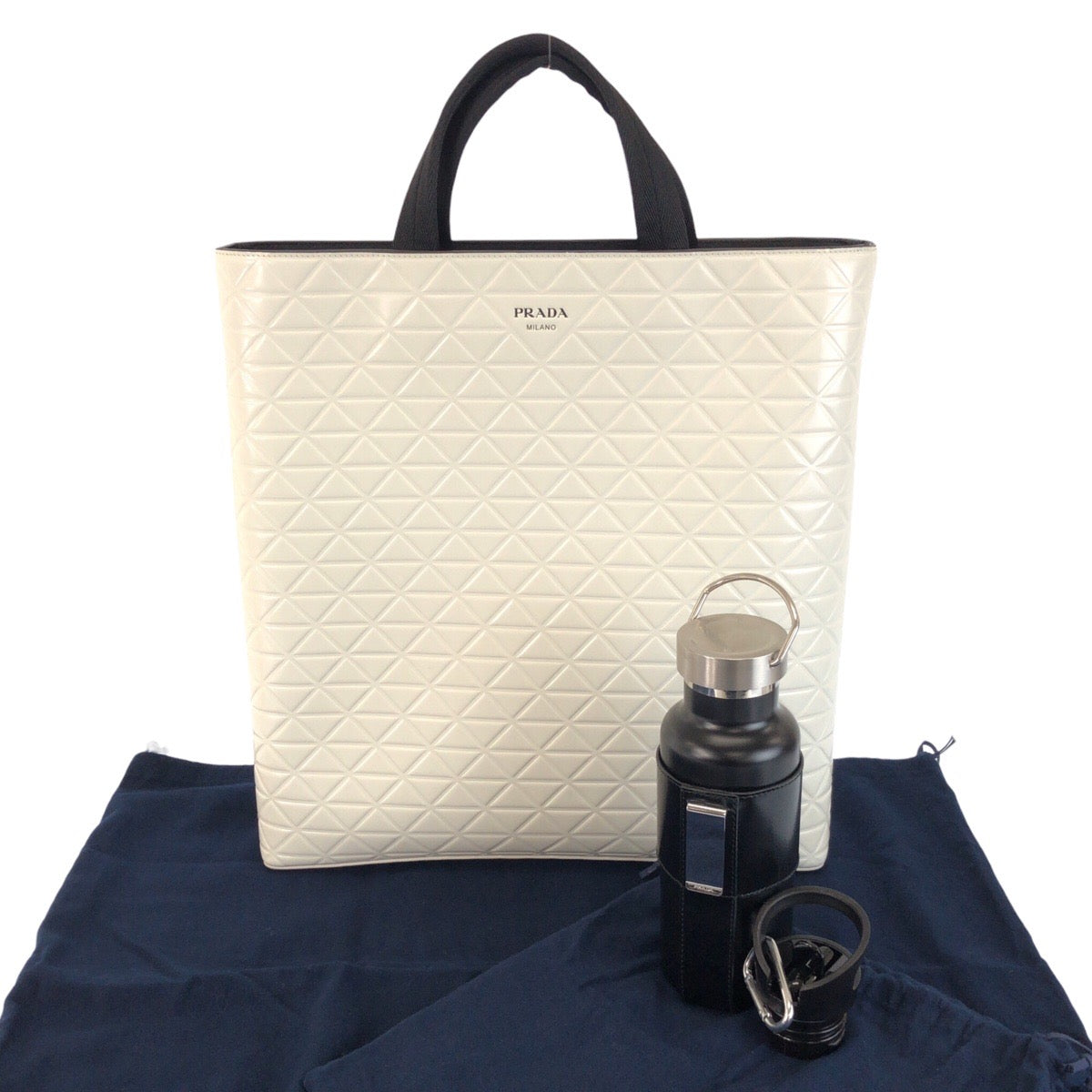 24453
PRADA プラダ 未使用 水筒付き ホワイト ブラック シルバー金具 レザー 2VG113 トートバッグ ビジネスバッグ 男女兼用 レディース A140
