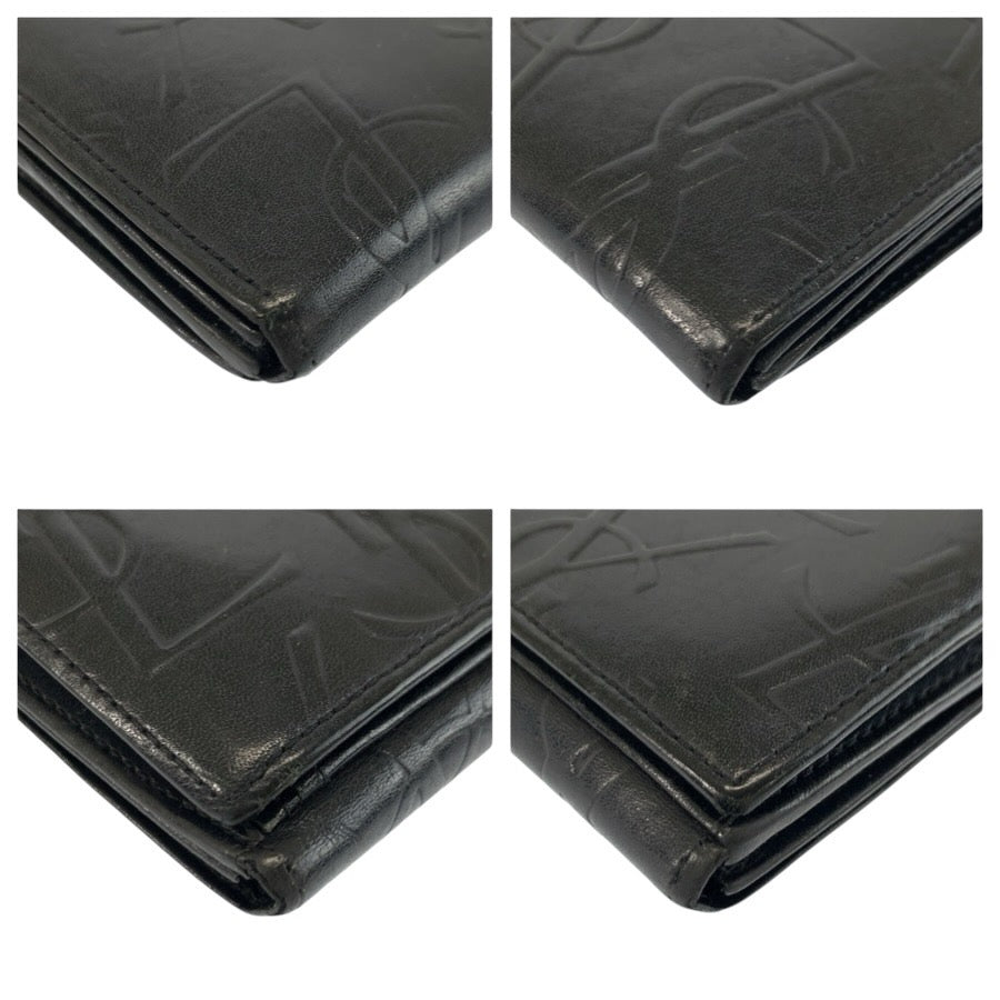 24683
YVES SAINT LAURENT イヴ サンローラン ロゴ 型押し ブラック 黒 レザー 折財布 コンパクトウォレット レディース AB9