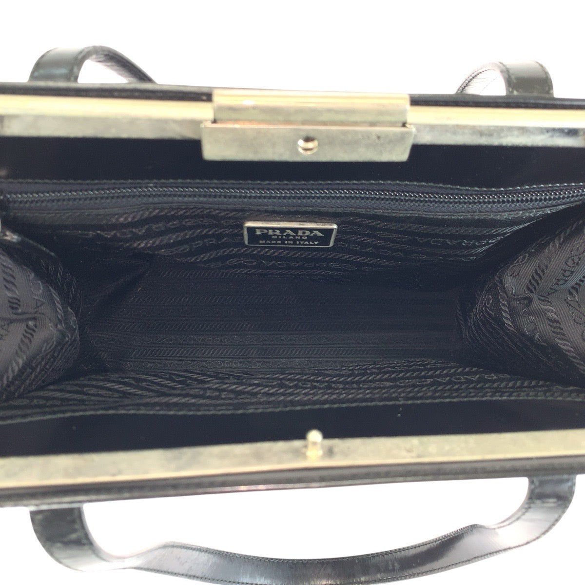 24783
PRADA プラダ ロゴ型押し ブラック 黒 シルバー金具 レザー ショルダーバッグ トートバッグ レディース ABP35