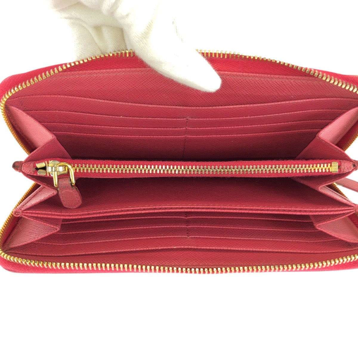 24868
PRADA プラダ サフィアーノ 三角ロゴプレート ピンク ゴールド金具 レザー 長財布 ラウンドファスナー レディース AB16
