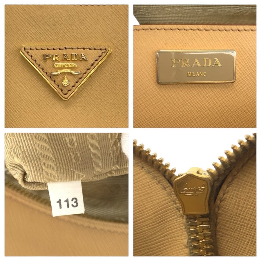 24869
PRADA プラダ サフィアーノ 三角ロゴプレート ベージュ ゴールド金具 レザー ハンドバッグ トートバッグ レディース AB56