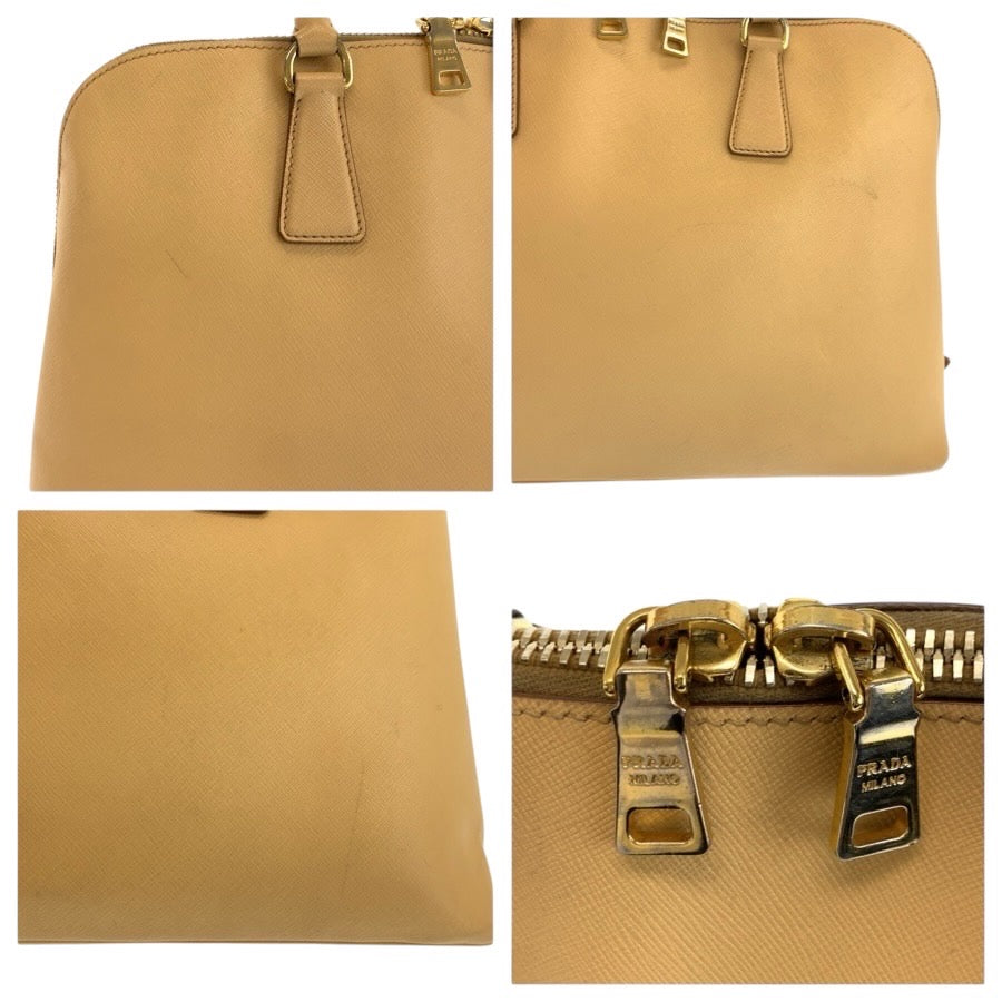 24869
PRADA プラダ サフィアーノ 三角ロゴプレート ベージュ ゴールド金具 レザー ハンドバッグ トートバッグ レディース AB56