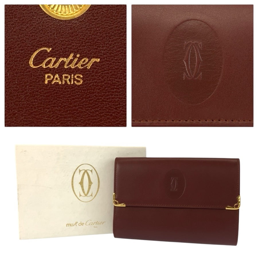 24902
CARTIER カルティエ マストライン ボルドー ゴールド金具 レザー 折財布 コンパクトウォレット レディース A23