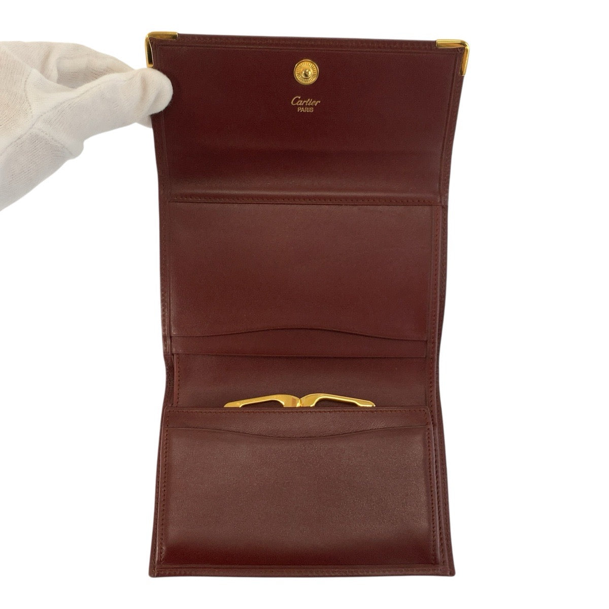24902
CARTIER カルティエ マストライン ボルドー ゴールド金具 レザー 折財布 コンパクトウォレット レディース A23