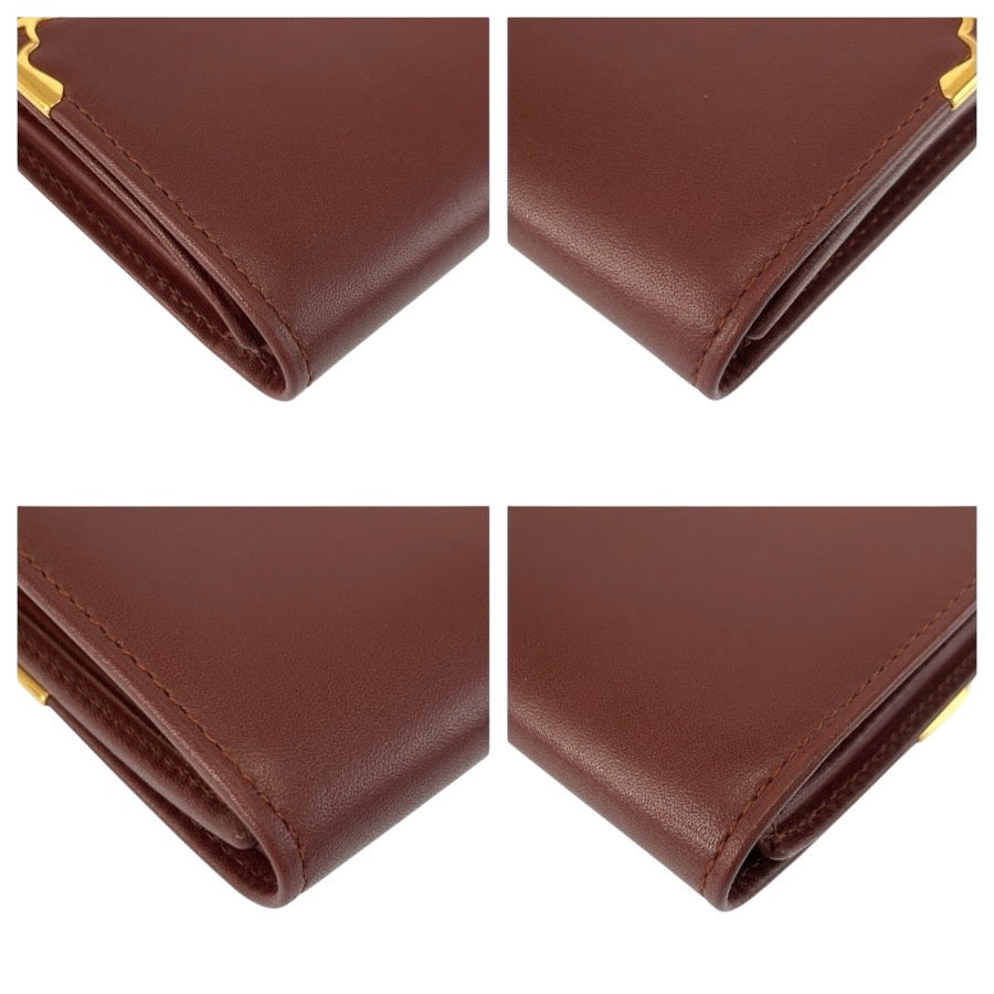 24902
CARTIER カルティエ マストライン ボルドー ゴールド金具 レザー 折財布 コンパクトウォレット レディース A23