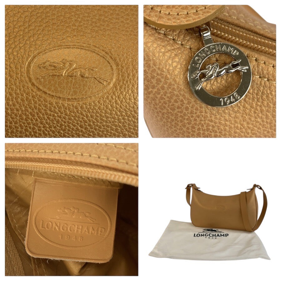 25267
Longchamp ロンシャン ベージュ シルバー金具 レザー ショルダーバッグ ポシェット レディース A21