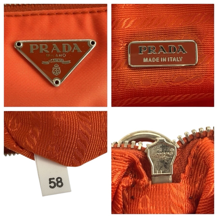 25309
PRADA プラダ テスート 三角ロゴプレート オレンジ シルバー金具 ナイロン ハンドバッグ アクセサリーポーチ レディース ABP42