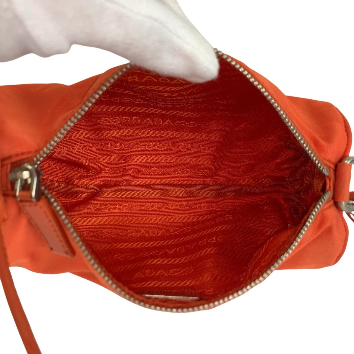 25309
PRADA プラダ テスート 三角ロゴプレート オレンジ シルバー金具 ナイロン ハンドバッグ アクセサリーポーチ レディース ABP42
