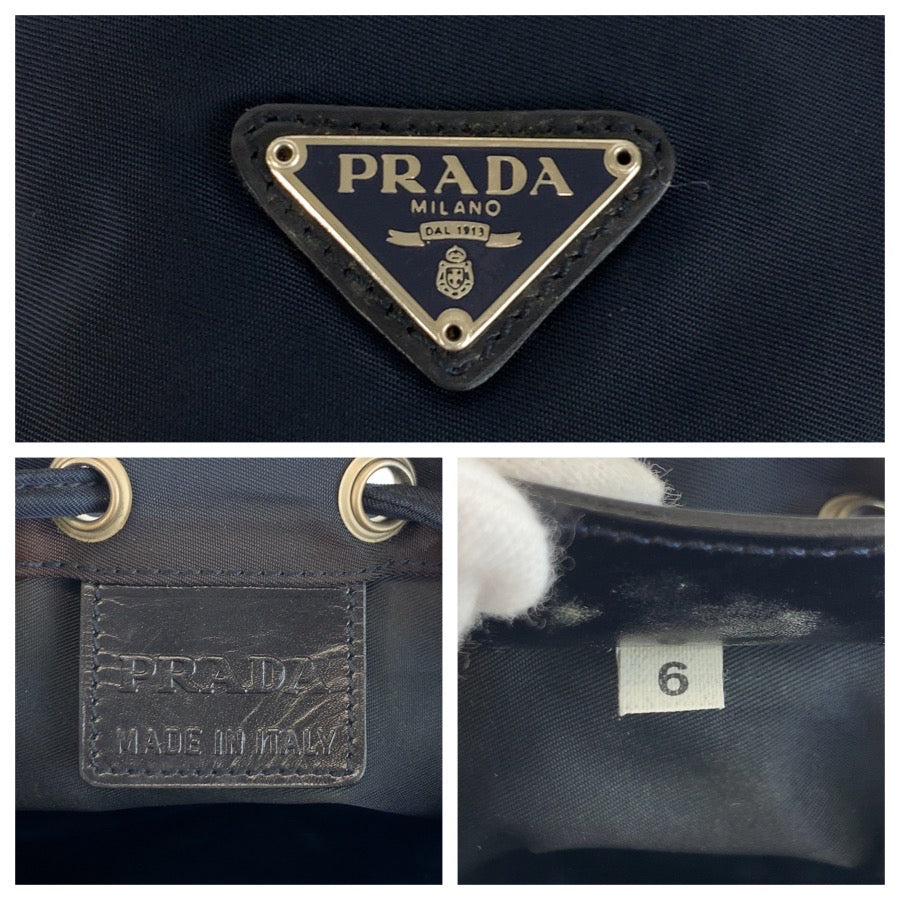 25350
PRADA プラダ テスート 三角ロゴプレート ネイビー シルバー金具 ナイロン 巾着ポーチ レディース AB16