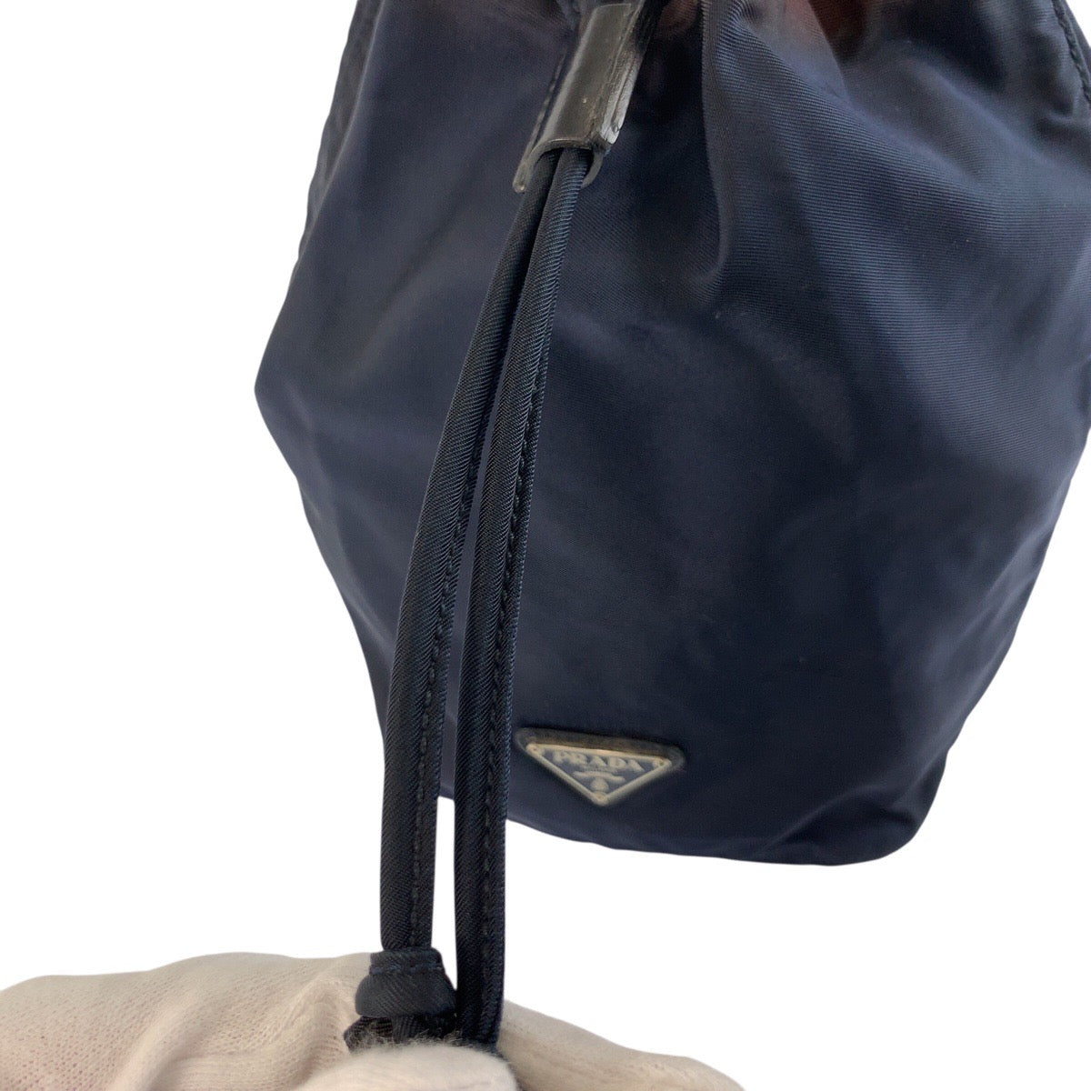 25350
PRADA プラダ テスート 三角ロゴプレート ネイビー シルバー金具 ナイロン 巾着ポーチ レディース AB16