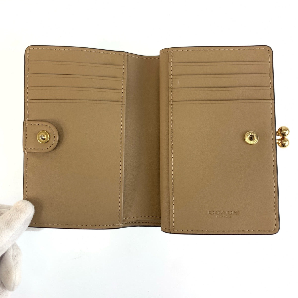 25593
COACH コーチ フローラル キスロック アイボリー ピンク ゴールド金具 PVC C8737 折り財布 コンパクトウォレット レディース ABP1