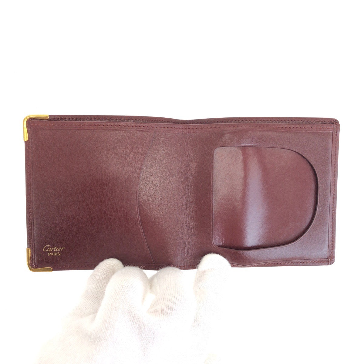 25596
CARTIER カルティエ マストライン ワインレッド ゴールド金具 レザー 札入れ コンパクトウォレット メンズ A10