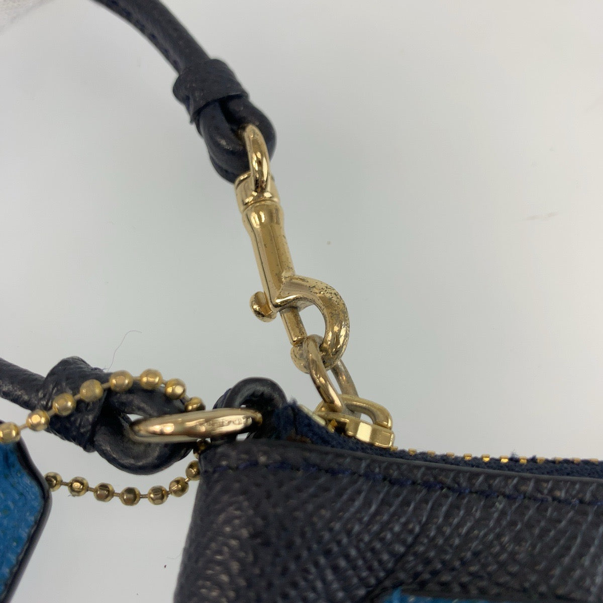 25599
COACH コーチ ブルー ネイビー ゴールド金具 レザー 65141 リストレットポーチ コインケース レディース ABP1