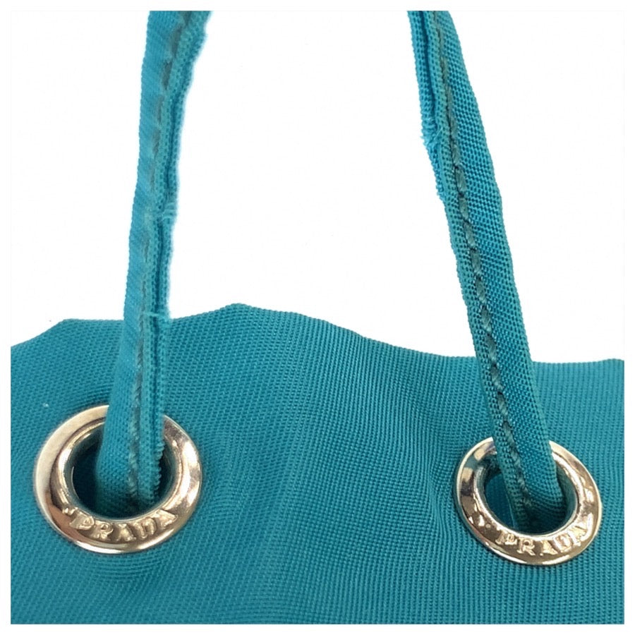 26135
PRADA プラダ テスート 三角ロゴプレート ブルー シルバー金具 ナイロン / レザー ポーチ 小物入れ 巾着 レディース ABP23