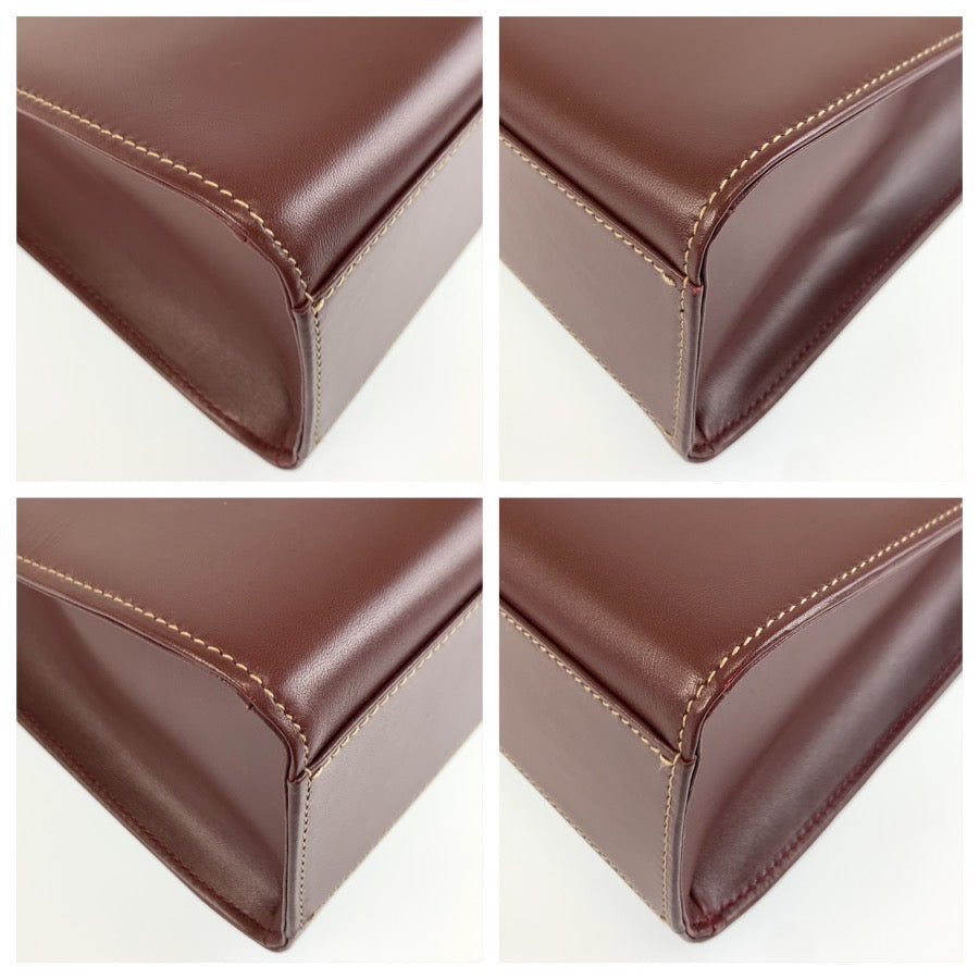26207
CARTIER カルティエ ヴィンテージ マストライン ボルドー ゴールド金具 レザー ハンドバッグ レディース A44