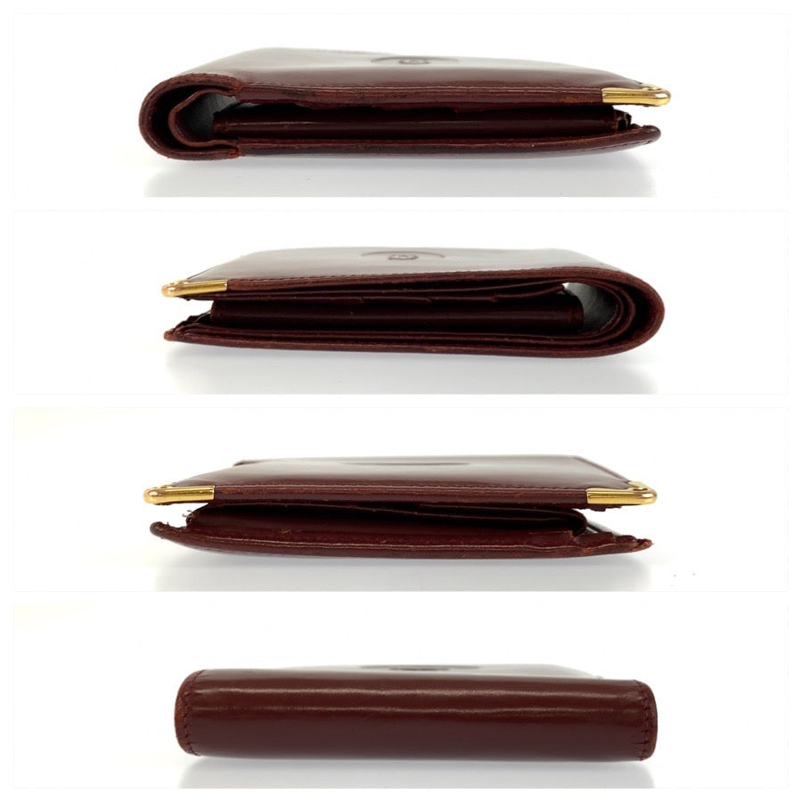 26385
CARTIER カルティエ マストライン ワインレッド ゴールド金具 レザー 折財布 コンパクトウォレット メンズ AB14