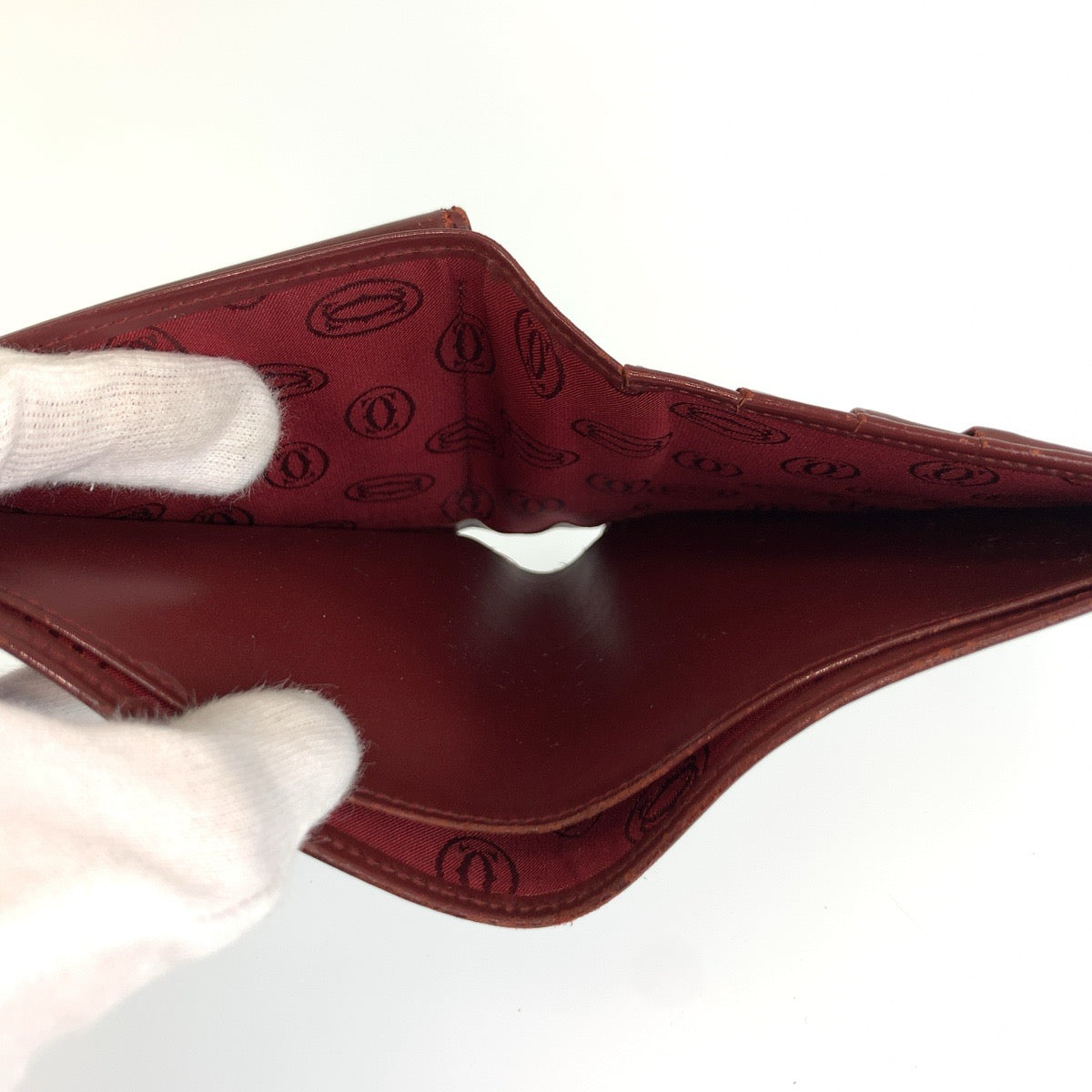 26385
CARTIER カルティエ マストライン ワインレッド ゴールド金具 レザー 折財布 コンパクトウォレット メンズ AB14