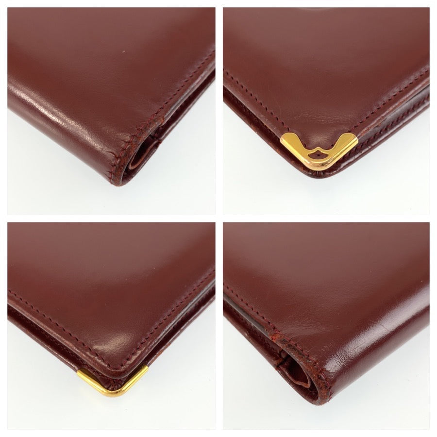 26385
CARTIER カルティエ マストライン ワインレッド ゴールド金具 レザー 折財布 コンパクトウォレット メンズ AB14
