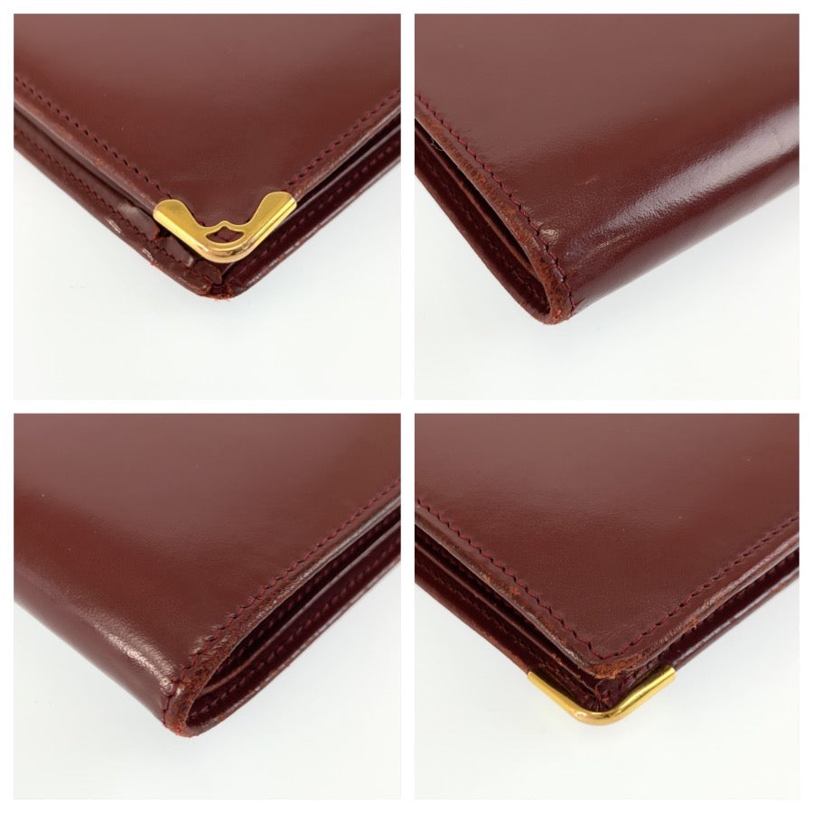 26385
CARTIER カルティエ マストライン ワインレッド ゴールド金具 レザー 折財布 コンパクトウォレット メンズ AB14