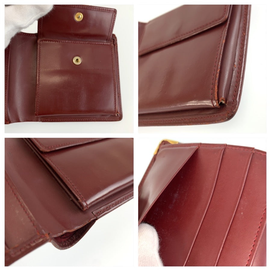 26385
CARTIER カルティエ マストライン ワインレッド ゴールド金具 レザー 折財布 コンパクトウォレット メンズ AB14