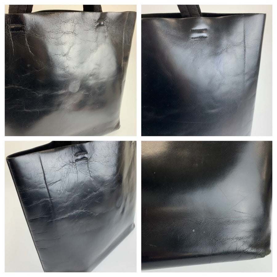 26525
PRADA プラダ パンチングロゴ ブラック 黒 レザー トートバッグ ショルダーバッグ レディース B14