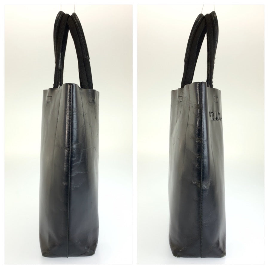 26525
PRADA プラダ パンチングロゴ ブラック 黒 レザー トートバッグ ショルダーバッグ レディース B14