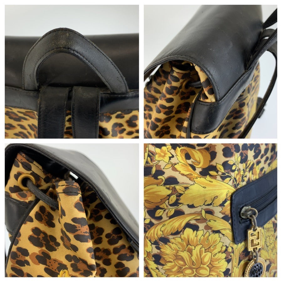 26587
VERSACE ヴェルサーチ レオパード柄 イエロー ブラック ゴールド金具 PVC / レザー リュックサック バックパック レディース AB29