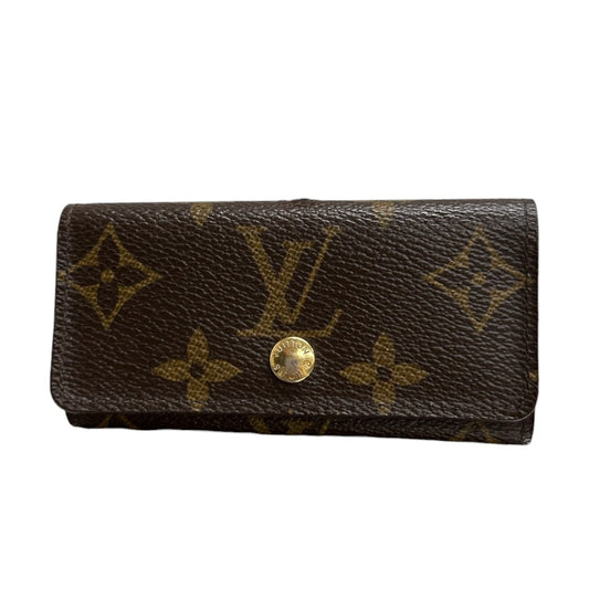 LOUIS VUITTON ルイヴィトン モノグラム ミュルティクレ４ ブラウン ゴールド金具 PVC M62631 キーケース レディース AB