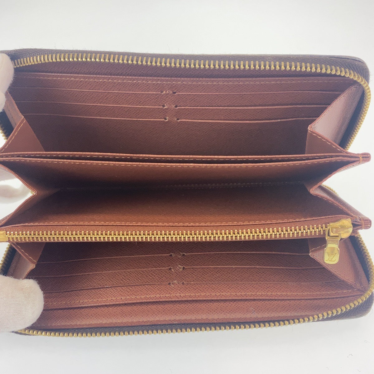 H-0036
LOUIS VUITTON ルイヴィトン モノグラム ジッピーウォレット ブラウン レザー M42616 長財布 ラウンドファスナー ラウンドジップ  レディース