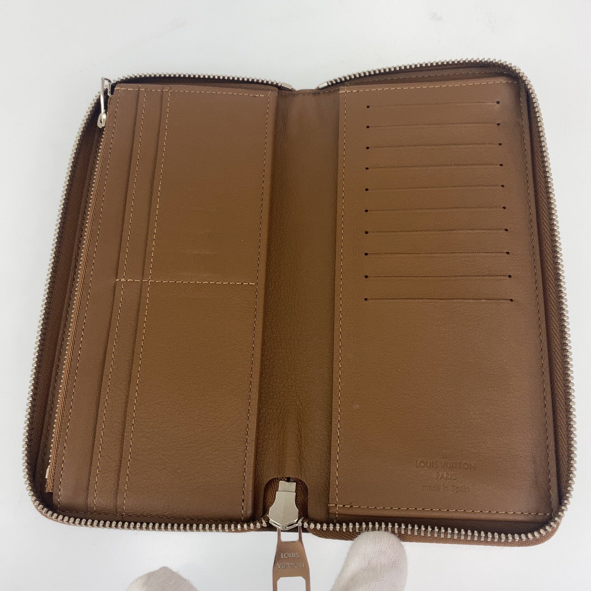 H-0038
LOUIS VUITTON ルイヴィトン トリヨン ジッピーウォレット ヴェルティカル ブラウン シルバー レザー M58864 長財布 ラウンドファスナー ラウンドジップ  メンズ