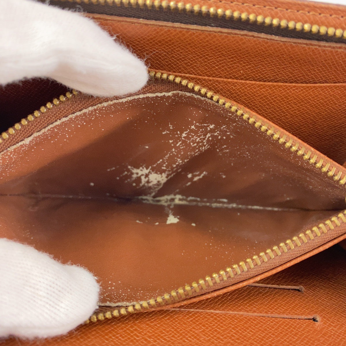 B-062
LOUIS VUITTON ルイヴィトン モノグラム ポルト モネ ジップ ブラウン レザー M61727 長財布 ラウンドファスナー ラウンドジップ  レディース